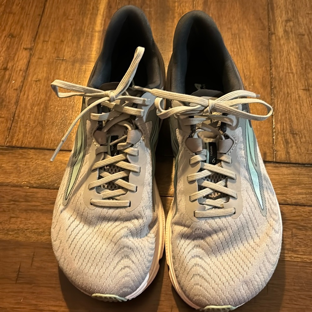 Altra, Woman’s size 9.5 Torin 6 running shoe.  Grey/blue/navy.